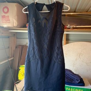 Navy blue fitted dress with design on front